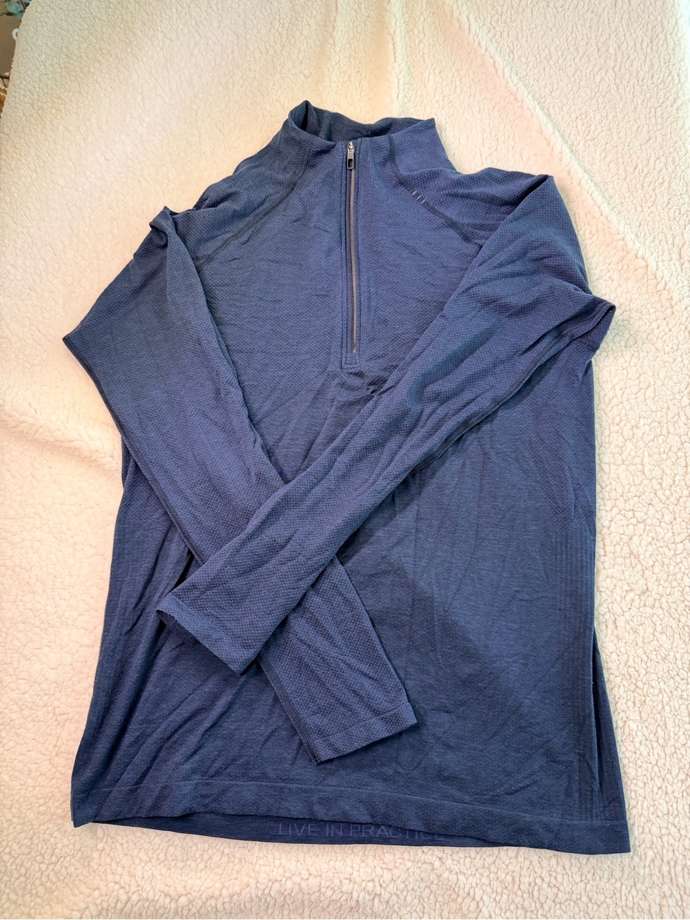 Two Lululemon athletics men’s high-performance half-zip shirt: one navyblueblack